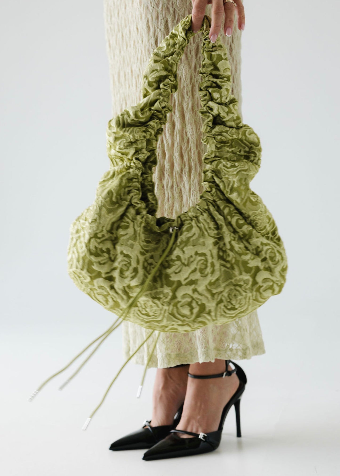 May • Hliðartaska