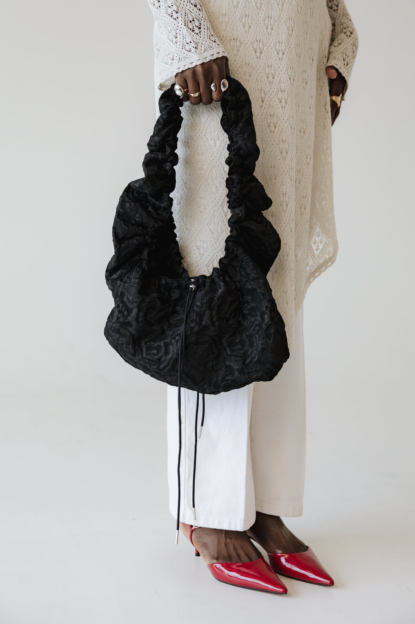 May • Hliðartaska