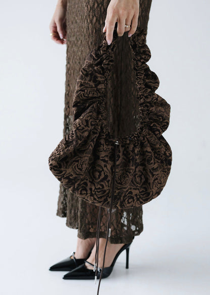 May • Hliðartaska