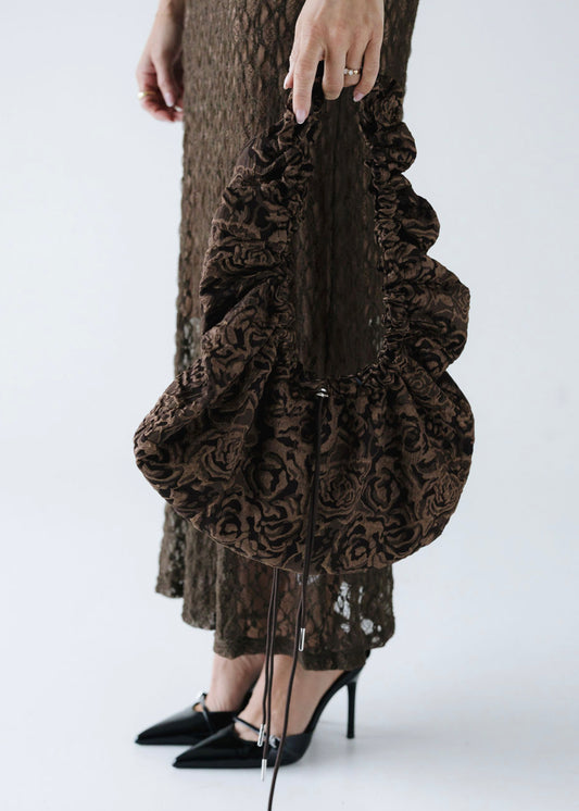 May • Hliðartaska