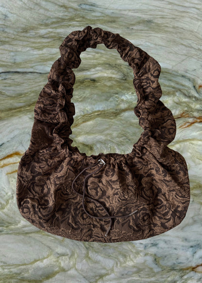 May • Hliðartaska