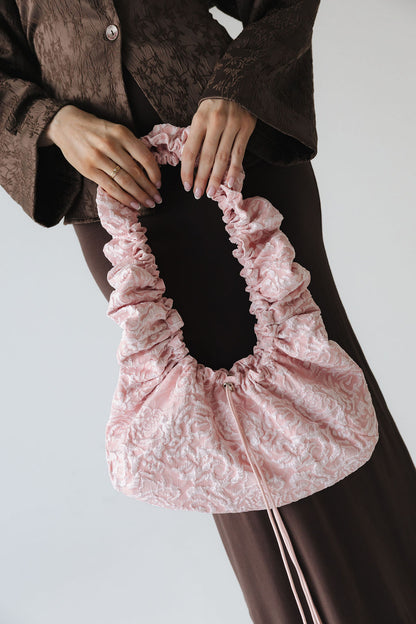 May • Hliðartaska