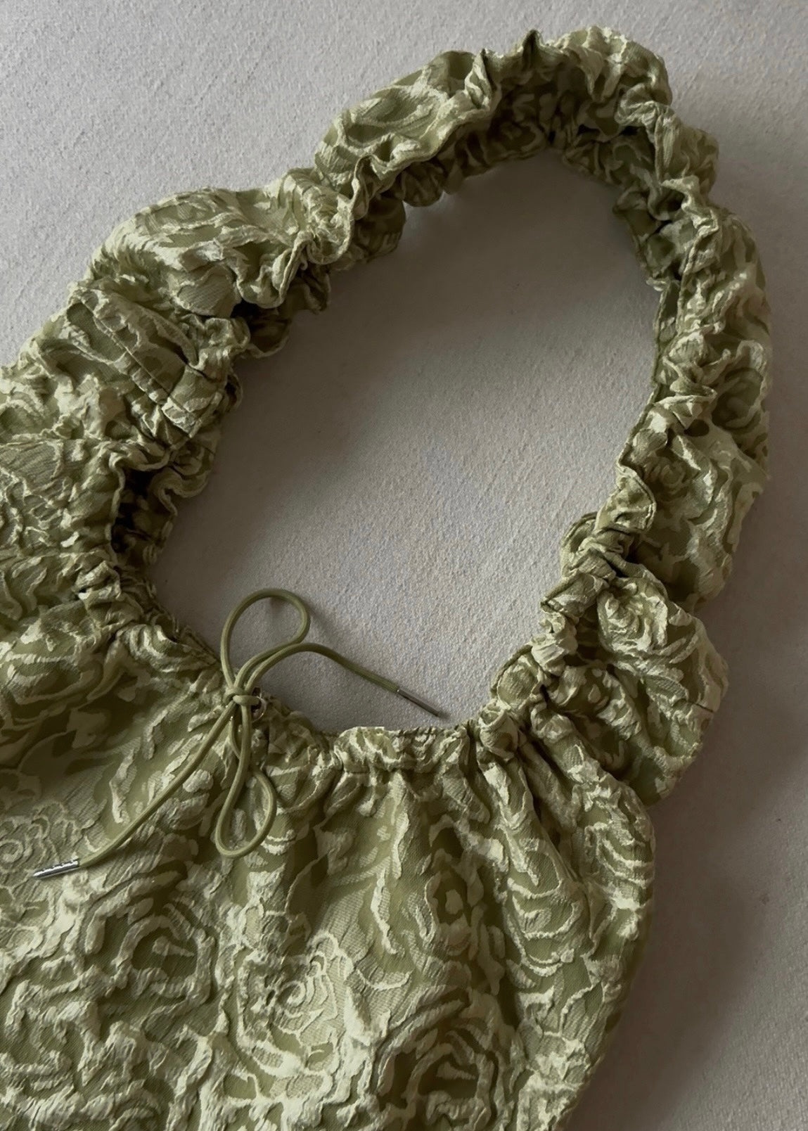 May • Hliðartaska