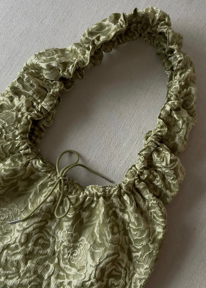 May • Hliðartaska